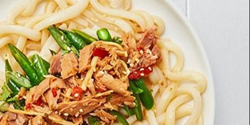Stir fry with Sealord lemon sesame ginger tuna, colourful vegetables, and noodles served in a bowl for a quick and healthy meal.