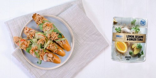 Bruschetta topped with Sealord lemon sesame ginger tuna, diced tomato, and herbs served on toasted bread slices.