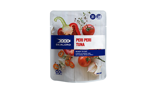 Sealord Peri Peri Tuna pouch with fresh ingredients on the packaging, including tomatoes, capsicum, garlic, and herbs – ready to eat, spicy tuna snack.